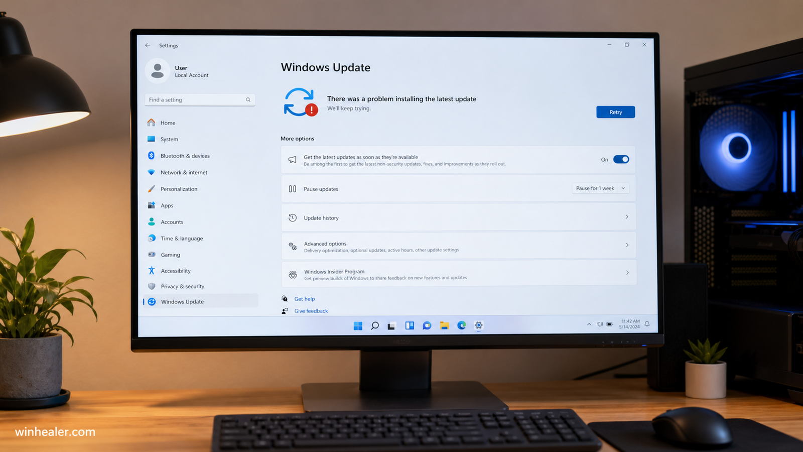 Windows 11 Update page showing an update error on a desktop PC